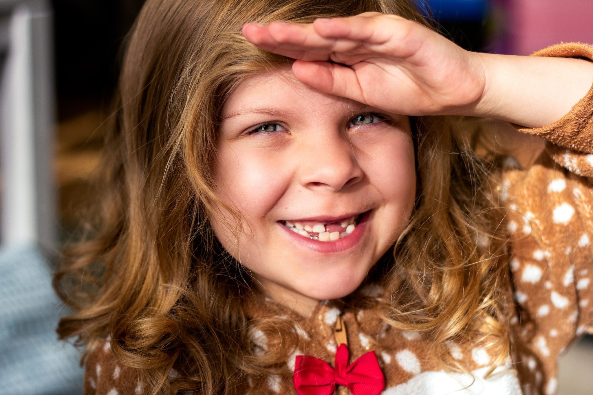 Little girl with missing front teeth