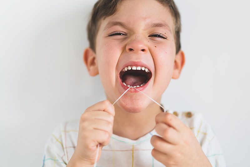 Should You Be Flossing Your Child’s Teeth?